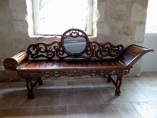 Antique rekamier in oriental style. It is made of wood. France, the XVIII century.