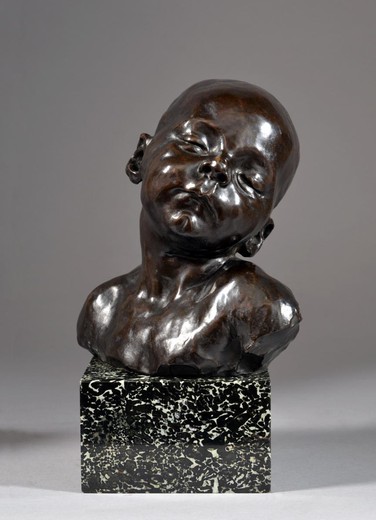 Antique sculpture "The Sleeping Child". It is made of bronze. The base is marble. The work of the famous French sculptor - Jules Dahl. France, XIX century.