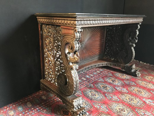 Antique console in a colonial style. It is made of rosewood. France, XIX century.