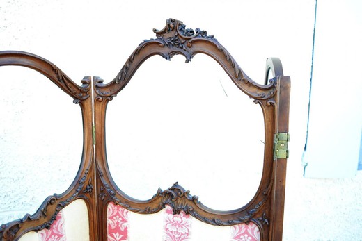 Antique screen in the style of Louis XV. It is made of walnut. France, XIX century.