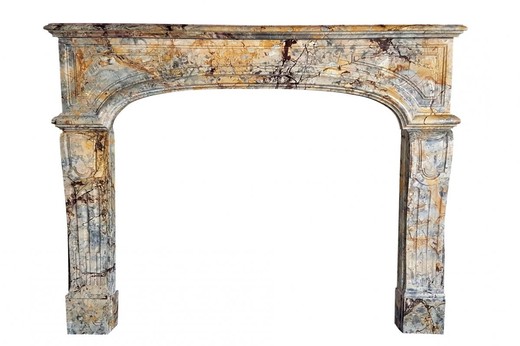 Antique fireplace portal in the style of Louis XVI. It is made of pyrenean marble Sarrankolin. France, the XVIII century.