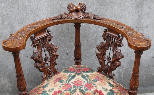 Antique corner chair in the style of Napoleon III. Made of walnut. France, XIX century.