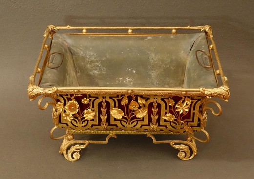 Antique jardiniere in the style of Louis XIV. It is made of gilded bronze. France, XIX century.Antique jardiniere in the style of Louis XIV. It is made of gilded bronze. France, XIX century.