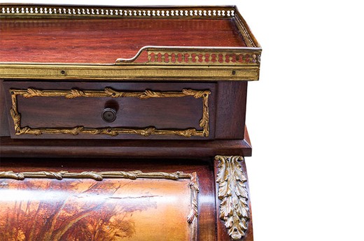 Antique bureau in the style of Louis XV. It is made of wood. Decorated with painting. Europe, the 1880s.