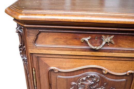 An antiquarian dresser in the style of Louis XV. Made of walnut. Europe, the 1880s.