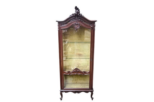 Antique showcase in the style of Louis XV. It is made of mahogany. Europe, the 1880s.