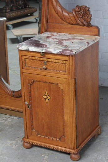 shop of antique furniture items of decor and interior in the style of Louis XVI of oak with marble in Moscow