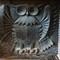 antique fireplace plate made as an owl