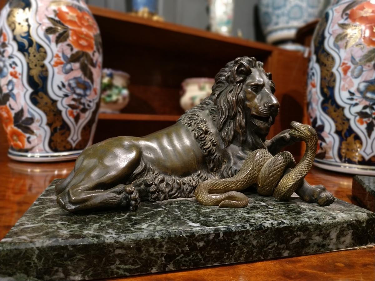 Antique pair sculpture "Fighting with snakes"