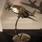 Antique airplane mounted as a lamp