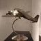 Antique airplane mounted as a lamp