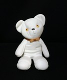 Toy porcelain bear for her
