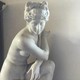 Antique sculpture Venus after bathing