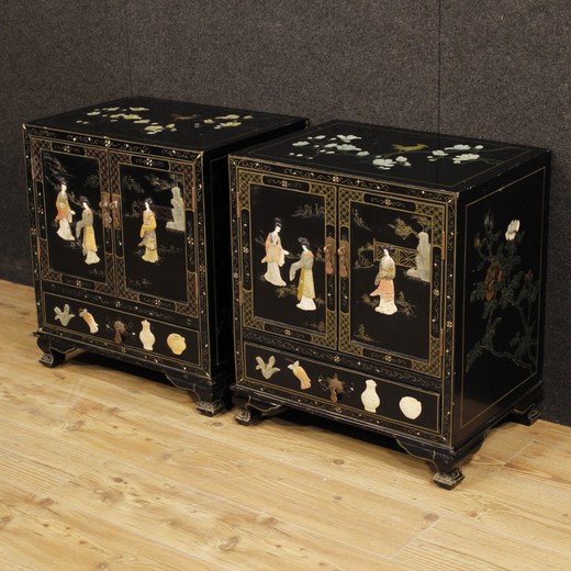 Antique twin cabinets in the oriental style of wood with soapstone furniture with minerals