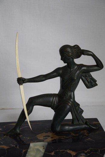 Antique sculpture "Diana-hunter". It is made of bronze and bone. The base is marble. The work of the famous Spanish sculptor - Haime Sabartes i Gual. France, the 20th century.