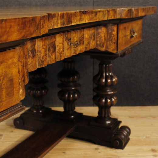 Antique desk in Tudor style. Made of walnut and mahogany. France, the 20th century.