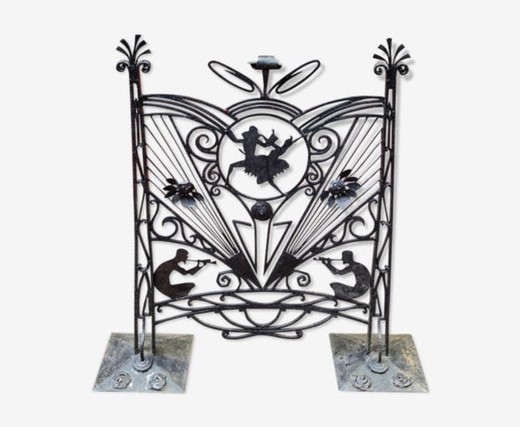 Antique fireplace screen in the style of Art Deco. Made of metal. France, the 20th century.