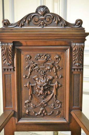 Antique throne with beautiful carving in the Renaissance style. Made of walnut. France, XIX century.