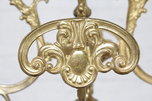 Antique coat rack in the style of Louis XV. It is made of gilded bronze. Italy, the middle of XX century.