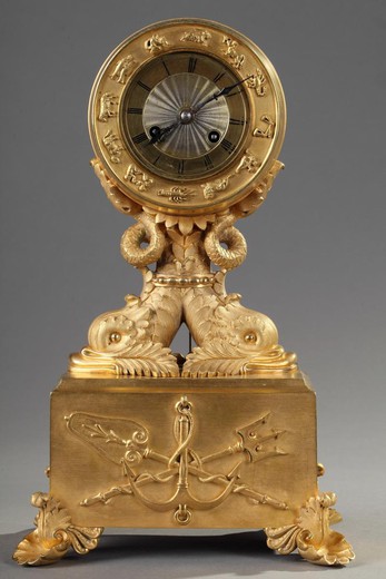Antique bronze clock with dolphins