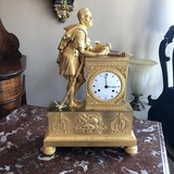 Antique bronze clock with a Roman soldier