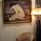 Antique painting a naked next to the canape