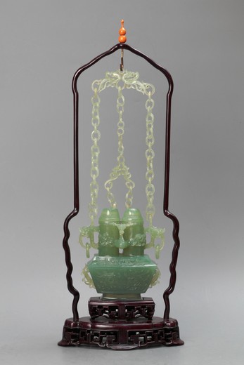 Antique incense burner hanging with a chain