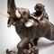 Antique sculpture "Elephant with tigers"