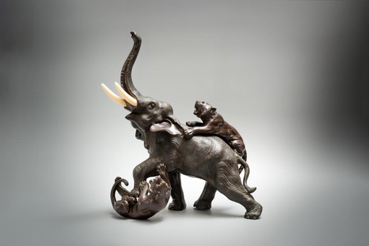 Antique sculpture "Elephant with tigers"