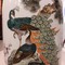 Antique vase with peacocks