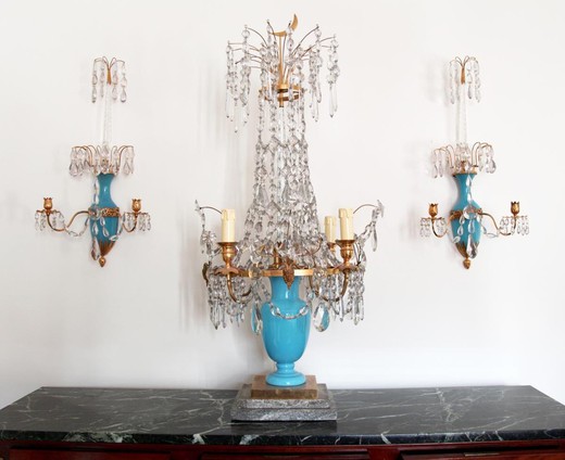 Antique girandole and paired sconces