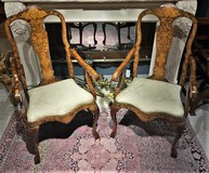 A pair of antique chairs