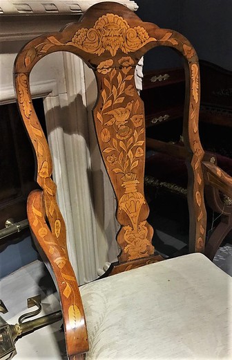 A pair of antique chairs