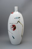 Vase with a pomegranate and a bird