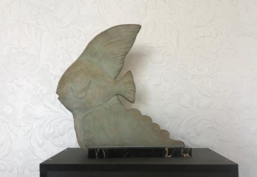 Antique angelfish sculpture