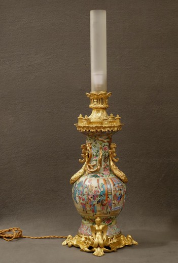 antique paired lamps made of porcelain and gilded bronze