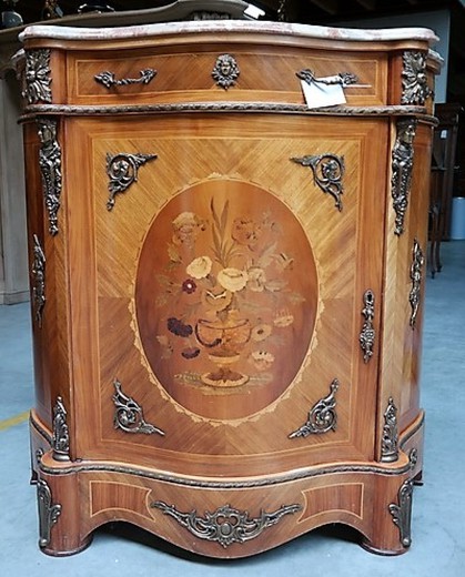 antique chest of drawers in the style of Louis XV