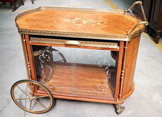 an antique serving table in the style of Louis XVI