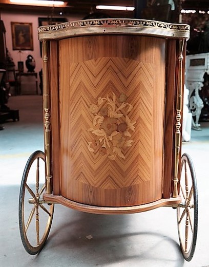 an antique serving table in the technique of marquetry