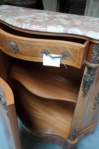 antique chest of drawers in the style of Louis XV