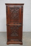 Antique carved gothic cabinet