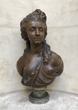 Antique young woman sculpture