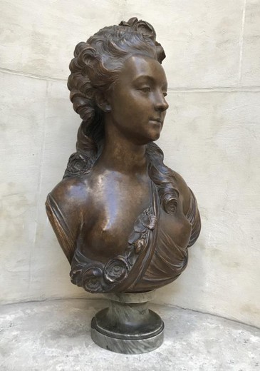 Antique young woman sculpture