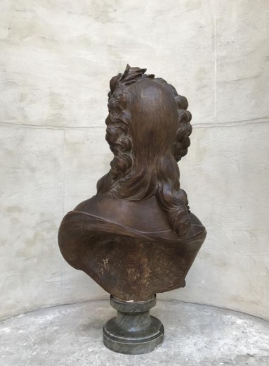 Antique young woman sculpture