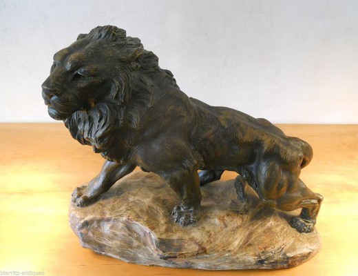 Terracotta lion sculpture