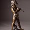 Antique sculpture "The boy with a pipe."