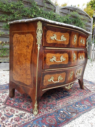 an antique chest of drawers