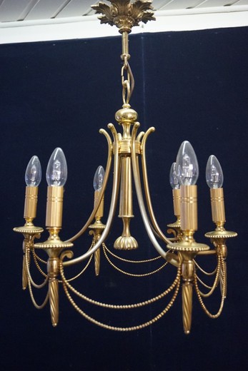 antique chandelier in Empire style
