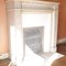 Small antique Louis XVI style fireplace
