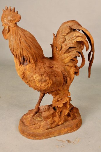Antique sculpture of a rooster